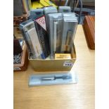 Seven Parker biros or similar in fitted perspex boxes, two other pens and various refills and a