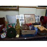 A quantity of Christmas decorations, a large photograph frame with individual photograph sections, a