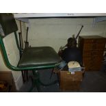 An industrial lot including aluminium lights, Smiths alarm clock, a green office chair, folding