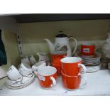 A Royal Doulton Bamboo pattern part tea service plus another 1970s orange Royal Doulton tea service.