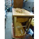 A glamorous Italian food trolley with decorative floral top and gilt gallery, a small tray similar