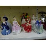 Four Royal Doulton figurines comprising Sweet One HN 1318, Top O'Hill HN 1834, Biddy Penny