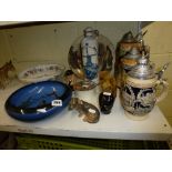 Four pottery steins with pewter lids, a Royal Copenhagen figurine of a dog, possibly a dachshund,