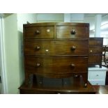 An early 19th century mahogany bow-fronted chest of two small over two long drawers on splayed