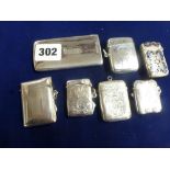 Five various silver vesta cases, Birmingham 1898-1929; an ejector card case, London 1909; and a late