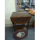 A Victorian oak occasional table with four flaps around a square floral carved top on fluted legs