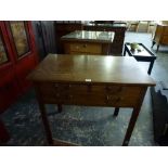 A useful 19th century mahogany side table above three drawers on canted square legs. WE DO NOT