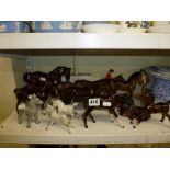 Fifteen mainly Royal Doulton and Beswick horses including a small grey Beswick horse, unglazed brown