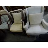 Three chairs comprising a small wing-back chair in satin fabric cover, a reproduction Georgian