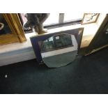 A 1930s circular mirror with etched decoration, a Superman mirror and a framed Dunlop plane print WE