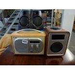 A pair of Logitech speakers Z130, a Ruark audio table top radio and a Pure Evoke 1S DAB radio [black