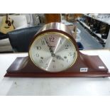 A modern three-train rod-chiming mantel clock by Franz Hermle in Napoleon hat case [A] WE DO NOT