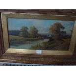 A 19th century oils on canvas, a view of a Continental riverside town at night, indistinctly signed,