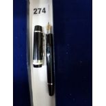 A Montblanc von Karajan black lacquered fountain pen with 18 carat gold nib numbered 4810, the lid