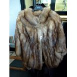A glamorous lady's light brown fur cape, probably sable, with shaped hem, Furs Renee London label