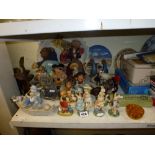 A varied lot including Goebel figurines of children, plus further figurines of rabbits, ducks,