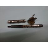 A Waterman Ideal Fountain Pen with sterling silver filigree outer case and New York nib and a