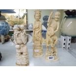 Three Japanese marine carvings, Meiji period, of a fisherman, of a lady, and of a deity with