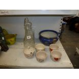 A Carlton Ware Rockery and Pheasant po, two cut glass decanters and stoppers, and five Poole pottery