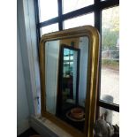 A large gold painted Victorian style overmantel mirror with beaded decoration WE DO NOT TAKE