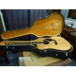 A Fender acoustic guitar model 85 in hard case WE DO NOT TAKE CREDIT CARDS OR CASH. STORAGE IS