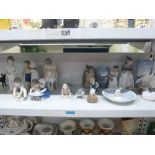 A good collection of Copenhagen porcelain, comprising 13 Royal items, including mermaid, owl,