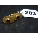 A pair of 14 ct gold cufflinks, each set with a rutile quartz cabochon, 7.5 gm gross WE DO NOT