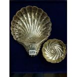 A late Victorian pierced silver shell dish, 9.6 in, Sheffield 1900; and a smaller silver footed