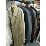 Gents' clothing including a Burberrys' raincoat, two suits, jackets, a cashmere overcoat, etc. [rail