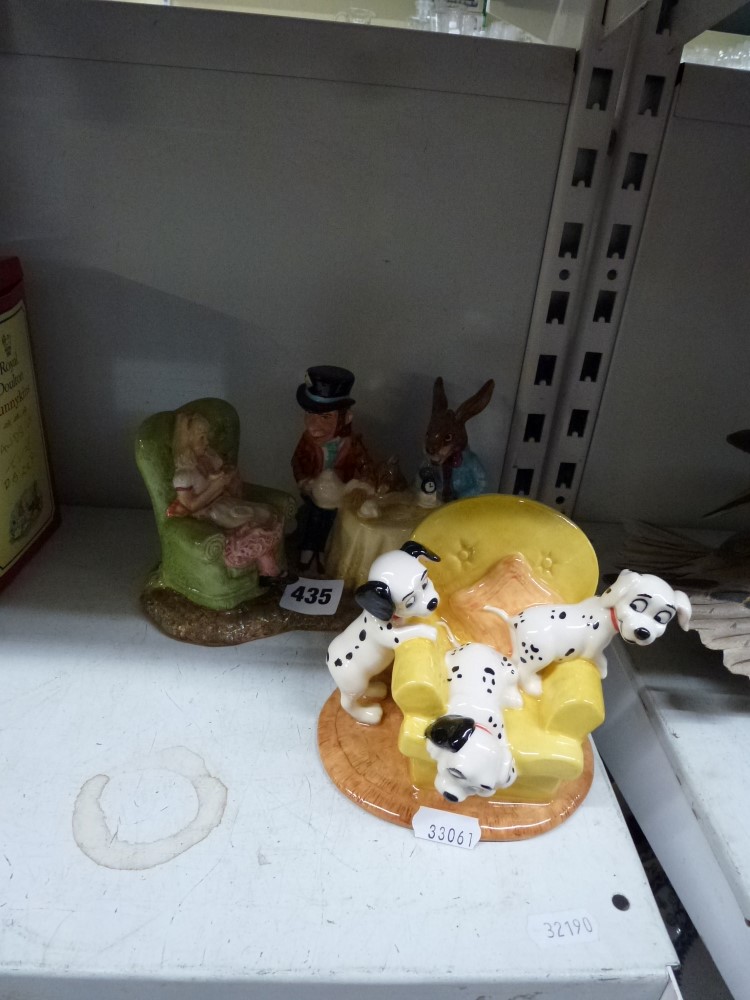 A Beswick Alice in Wonderland The Mad Hatter's Tea party figurine and a Royal Doulton 101 Dalmatians