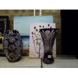 Two large amethyst overlaid cut glass vases and two unframed oils on canvas one of a seascape [