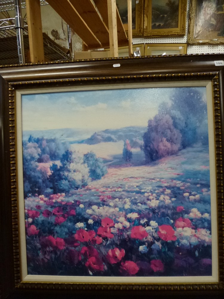 A large coloured print on a textured surface of red and white poppies in a meadow, and a framed