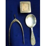 A silver wishbone sugar tongs, Birmingham 1929; a stamp box, Birmingham 1899; and an Old Mother
