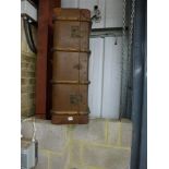A vintage fabric-covered trunk with wooden struts and brass fitments [end of aisle] WE DO NOT TAKE
