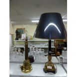 A fine quality table lamp of classical column form mounted in possibly ormolu stand on heavy