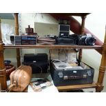A camera lot comprising of two Olympus CM10, a Leica manual, a Zeiss Ikon Ikonta, a Samsung AF