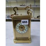 A French carriage clock circa 1900, half-hour striking and hour-repeating on a gong, with cream ring