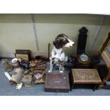 A large china figurine of a dog - possibly a Pointer, an oak spinning chair, a wooden framed