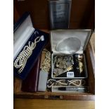 An altered Victorian box containing a two-row cultured pearl necklace with 9 ct gold snap, a pearl
