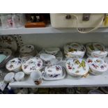 Royal Worcester Evesham pattern part dinner service including six tureens and covers, butter dish