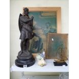 A good spelter figurine of a knight, possibly Richard the Lionheart, on circular wooden stand, a