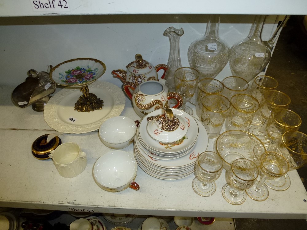 A 16-piece Victorian gilt-decorated glass set including a vase, jug, wine glasses, lemonade glasses,