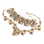 SET OF COLLIER AND BRACELET IN GILDED METAL ELSA SCHIAPARELLI FROM THE 1950s