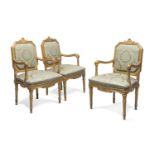 THREE 18TH CENTURY GILTWOOD ARMCHAIRS