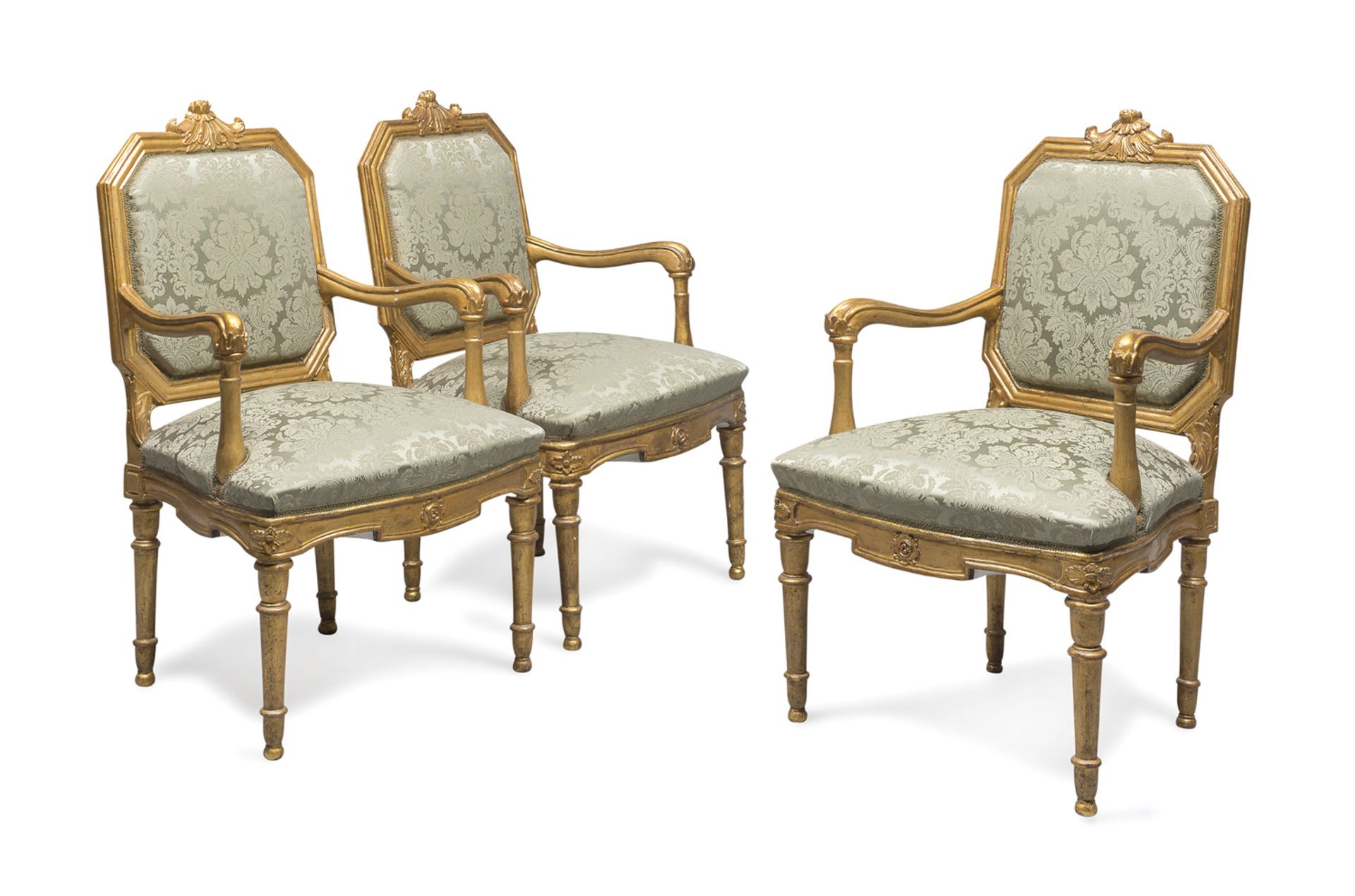 THREE 18TH CENTURY GILTWOOD ARMCHAIRS