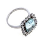 WHITE GOLD RING WITH BLUE STONE AND DIAMONDS