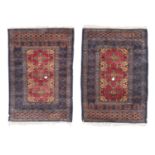 PAIR OF PAKISTAN BEDSIDE RUGS MID 20TH CENTURY