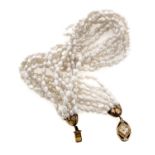 TORCHON NECKLACE OF FIVE PEARL STRINGS