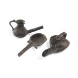 THREE PERSIAN BRONZE OIL LAMPS 19TH CENTURY.