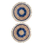 A PAIR OF ROUND CHINESE CARPETS. TIEN-TSIN MANUFACTURE MID-20TH CENTURY.